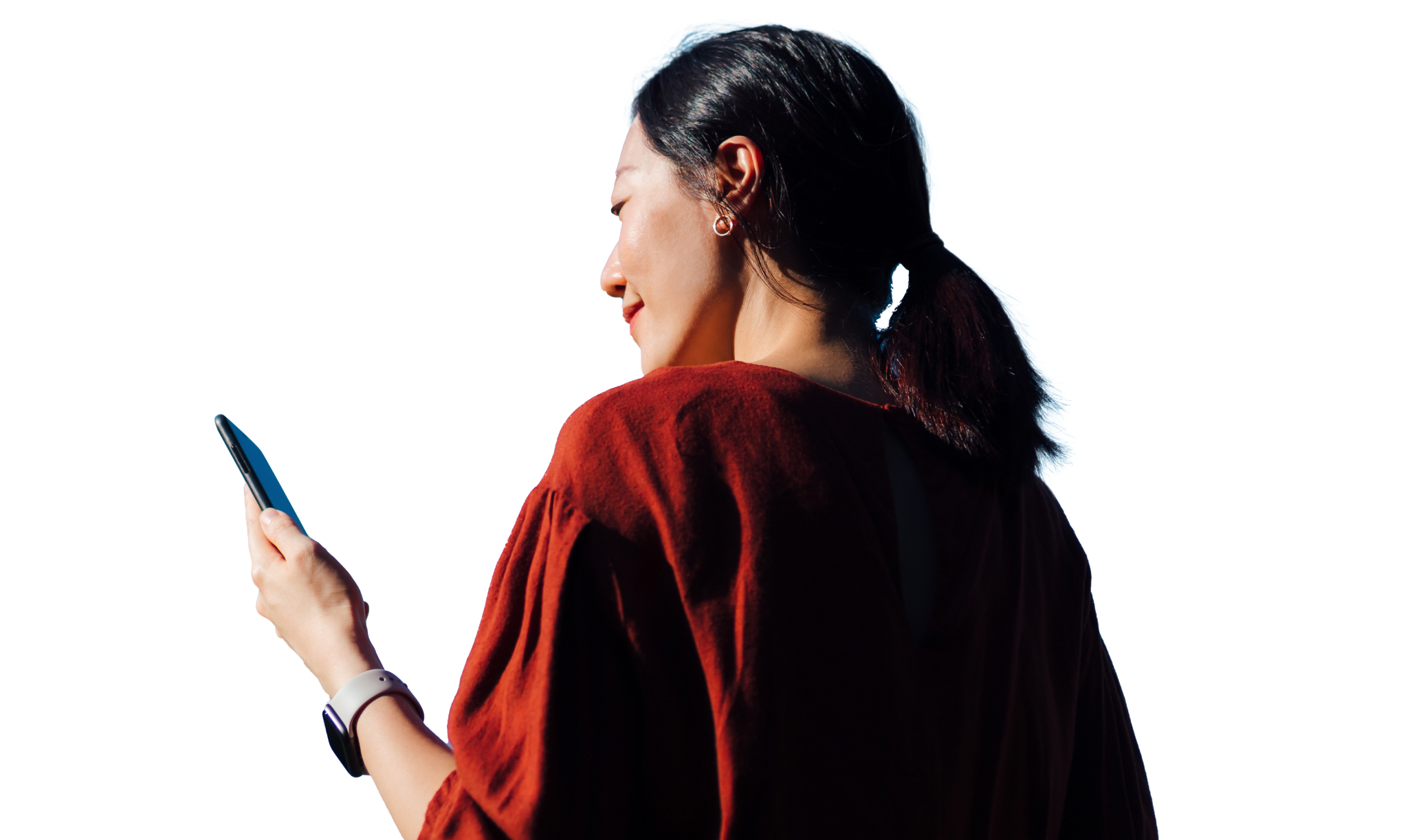 A woman looks at her phone that indicates an Informed Delivery notification.